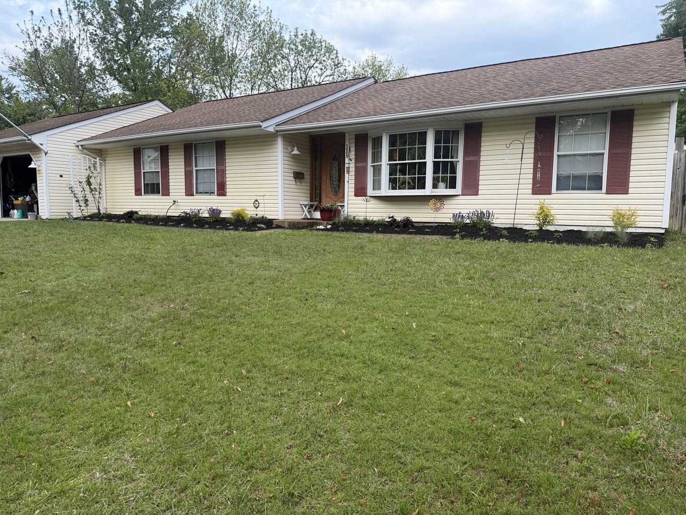 Landscape after refresh with mulch and plantings